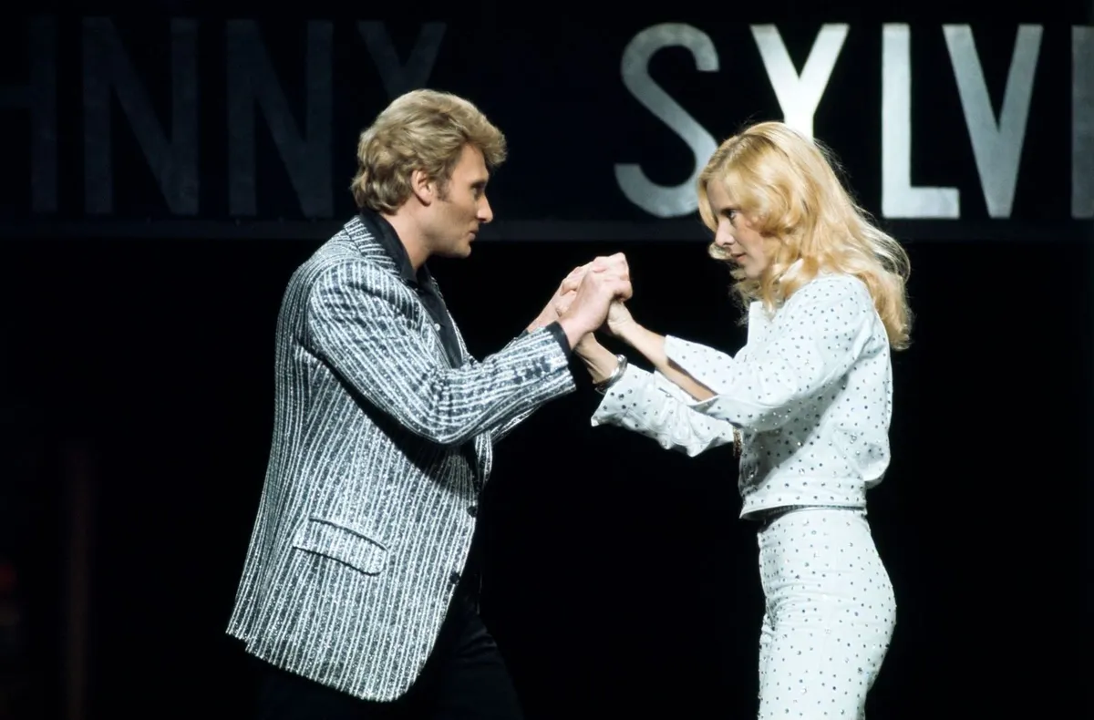 Johnny Hallyday et Sylvie Vartan sur scène | Photo : Getty Images