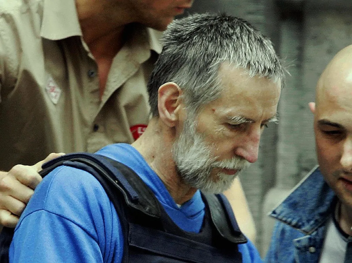 Michel Fourniret arrivant au quartier général de la police à Dinant.  |  Photo: Getty Images