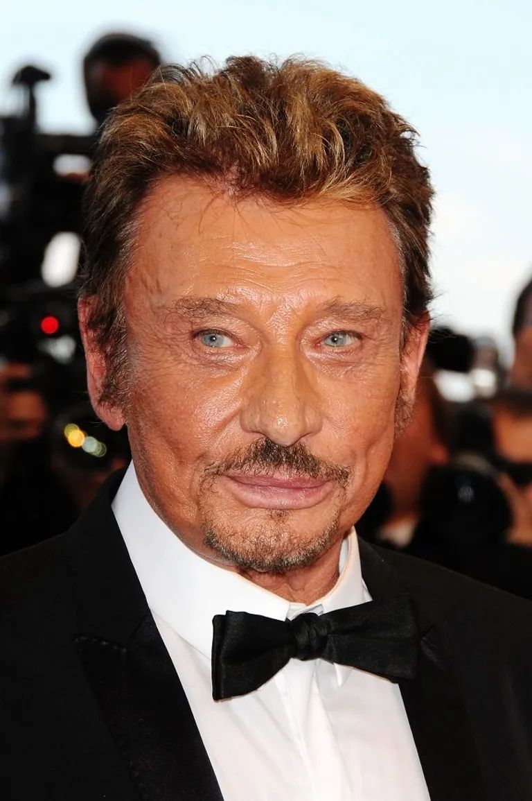 French singer and actor Johnny Hallyday poses for a portrait during the 18th annual City Of Lights, City Of Angels Film Festival at the Directors Guild of America on April 21, 2014 in Los Angeles.