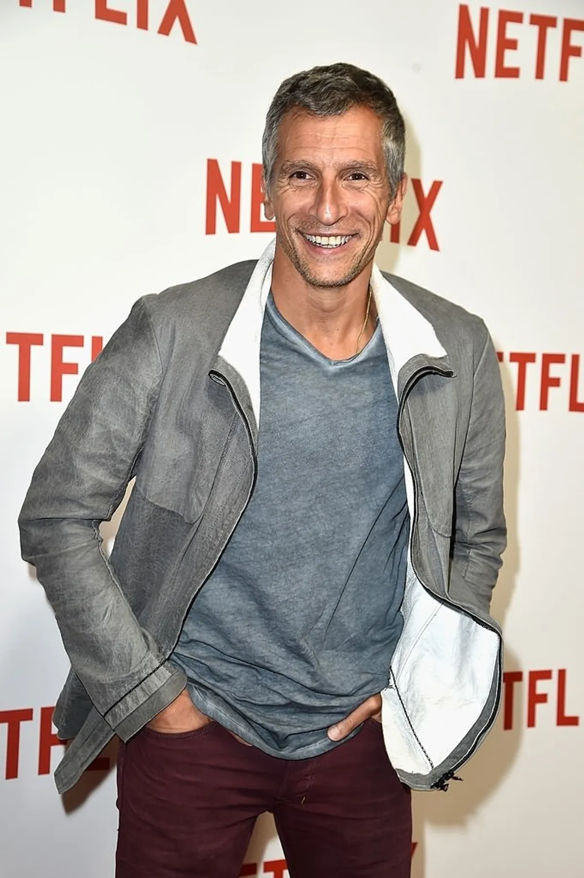PARIS, FRANCE - 15 SEPTEMBRE : Nagui assiste à la soirée de lancement de "Netflix" au Faust le 15 septembre 2014 à Paris, France. | Photo : Getty Images