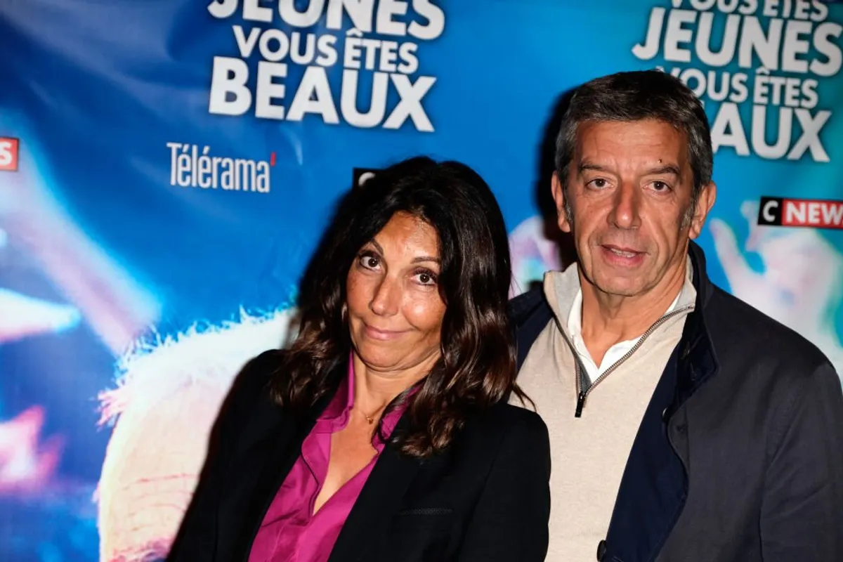 Michel Cymes et son épouse Nathalie Cymes assistent à la première de "Vous Etes Jeunes, Vous êtes Beaux" au Cinéma Gaumont Opéra le 23 septembre 2019 à Paris, France. | Photo : Getty Images