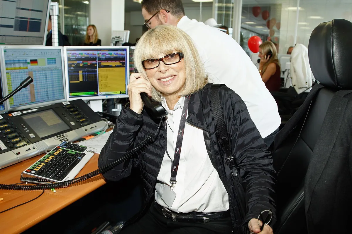 Mireille Darc assiste à Aurel BCG Charity Benefit Day 2014 le 11 septembre 2014 à Paris, France. | Photo : Getty Images