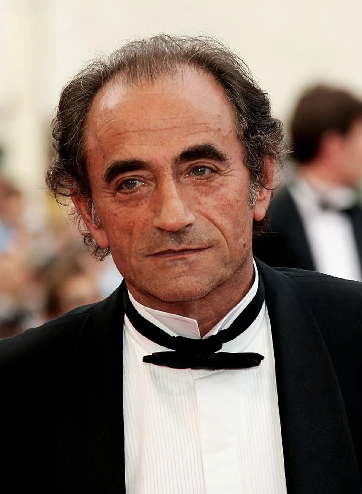 Richard Bohringer assiste à la première du film "Lemming" au Palais de Festival lors de la soirée d'ouverture du 58e Festival International du Film de Cannes le 11 mai 2005 à Cannes, France. | Photo : Getty Images