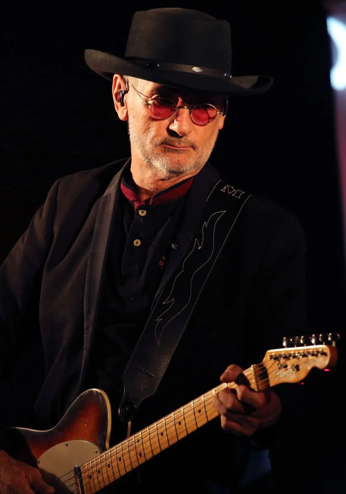Michel Fugain sur scène lors d'un concert à Marmande le 19 juillet 2019. | Photo : Getty Images