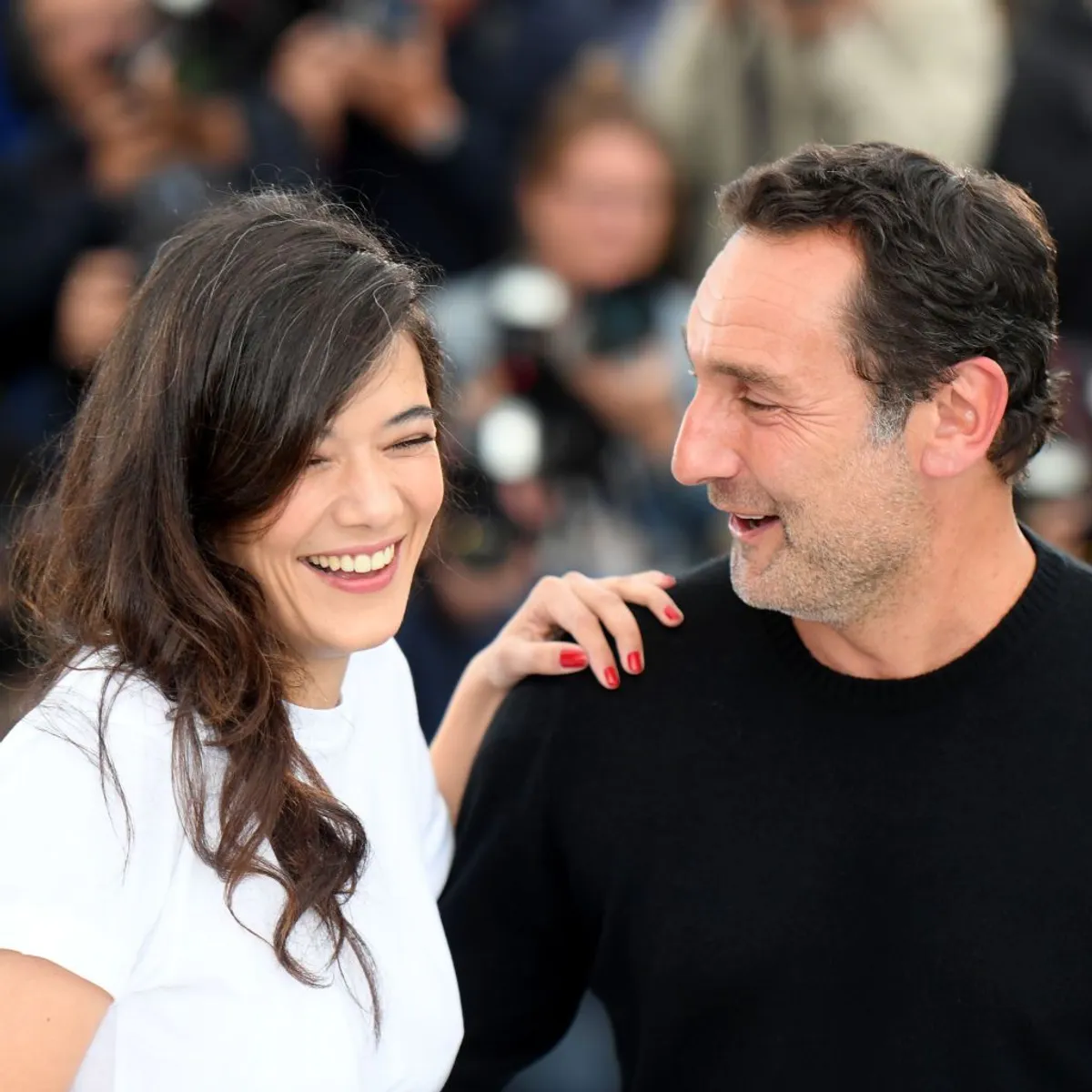 Le réalisateur Gilles Lellouche et l'actrice Melanie Doutey au Palais des Festivals le 13 mai 2018 à Cannes, France. | Photo : Getty Images